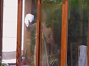 British Indian girlfriend cleaning the windows naked